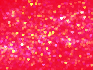 Red hearts wallpaper background. Defocused bokeh glitter.