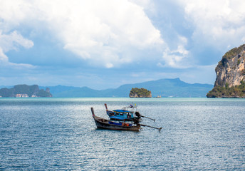 Fototapeta na wymiar The sea and the sky with fishing boat