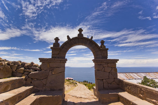 arch above titicaca lake in peru