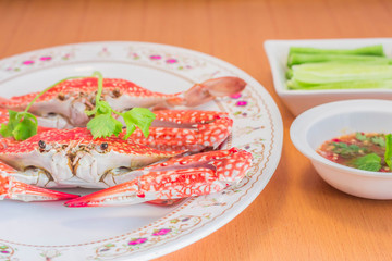 Steamed crab on the wooden
