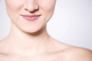 Close up  shot of woman face and bare shoulders