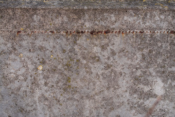 Old concrete with decal and moss