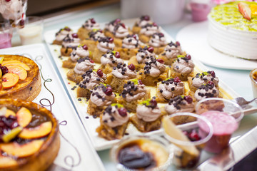 Cakes and pastries on buffet table