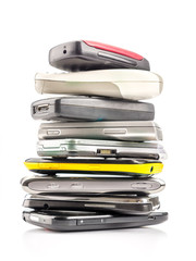 Pile of old mobile phones