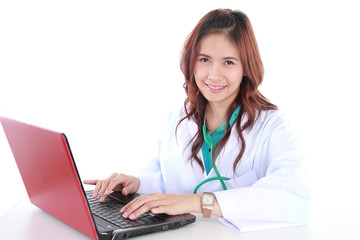 Female doctor use laptop