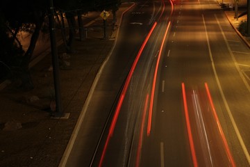 Late night traffic in downtown Tucson using long exposure or light painting. 