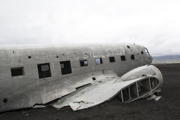 Airplane wreckage on a black sand beach, South Iceland