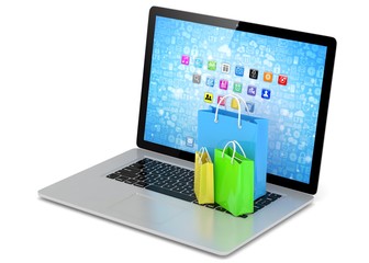 laptop and  shopping pags on white background. 3d rendering.