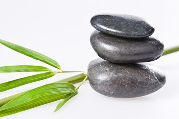 Obraz na płótnie Canvas spa la stone health therapy pebbles stack isolated on white with bamboo