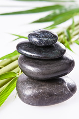Fototapeta premium spa la stone health therapy pebbles stack isolated on white with bamboo