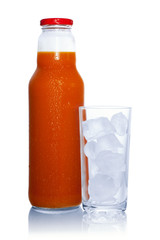 The juice of carrot and apple and a glass with ice. Isolated on
