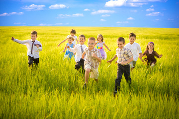 Happy Childhood Friends Running Together in Group