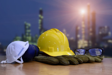 Set of safety work wear on tanker refinery background , image construction concept.