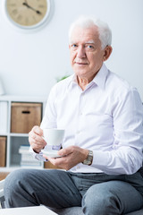 Older man and tea time