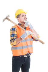 Pensive engineer or constructor with shovel on his shoulder
