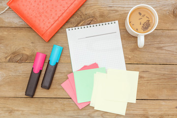 flat lay: green tea and writing in a notebook