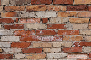Old rough brick rate close-up. Backgrounds and textures