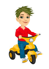 cute little boy riding a tricycle