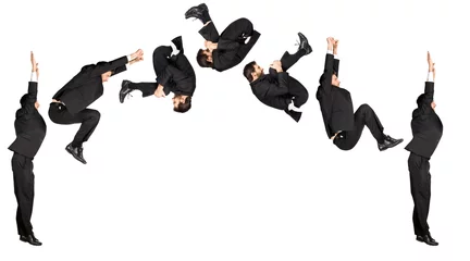 Foto op Plexiglas businessman somersault isolated on white © ZoneCreative