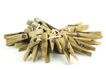 Wooden clothespins on a white background