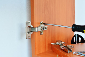 Hinge assembly on kitchen cabinet