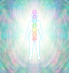 Chakra Energy Balancing  -  Soft pastel colored energy field around a white female silhouette with a turquoise glow, with seven chakras aligned centrally from crown to root - obrazy, fototapety, plakaty