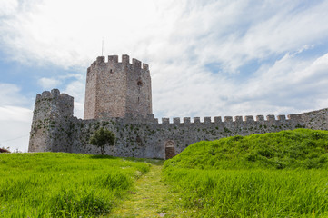 Fototapeta na wymiar Platamon fortress against dramatic sky, Greece, Europe