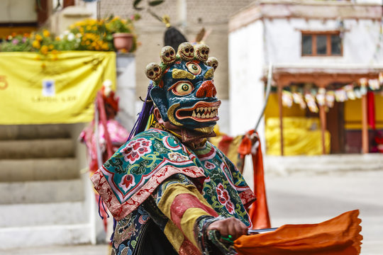 An unidentified buddhist lamas dressed in mystical mask dancing Tsam mystery dance in time of Yuru Kabgyat Buddhist festival at Lamayuru Gompa, Ladakh, North India