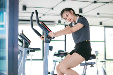 Young asian woman in the gym