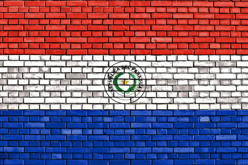 flag of Paraguay painted on brick wall