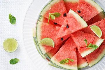 Watermelon. Slices of fresh watermelon on white
