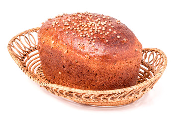 Black bread with fresh coriander seeds closeup