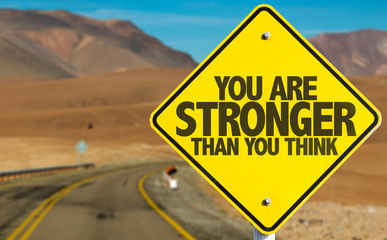 You Are Stronger Than You Think sign on desert road