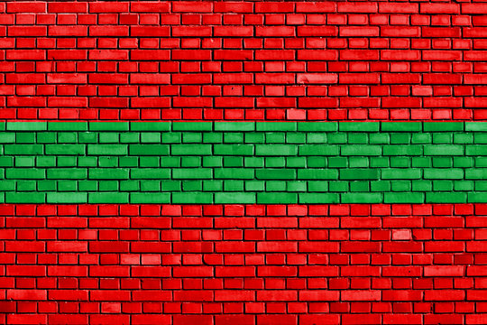 flag of Transnistria painted on brick wall