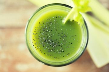 close up of fresh green juice glass and celery