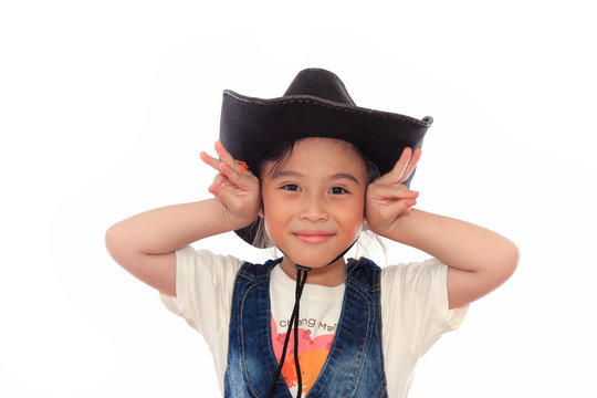 Beautiful asian girl in a cowboy hat