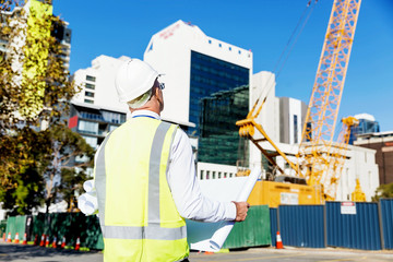 Engineer builder at construction site