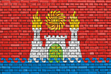flag of Makhachkala painted on brick wall