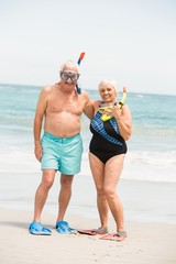 Senior couple wearing flippers