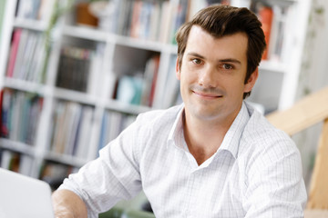 Fototapeta premium Young businessman in office