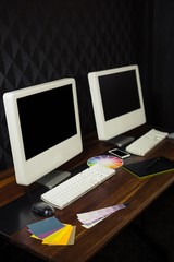 Two computers on a desk