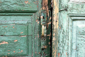 Door handle on an antique wooden door