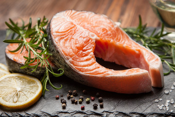 Fresh salmon on old wood