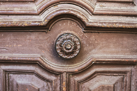 Door handle on an antique wooden door