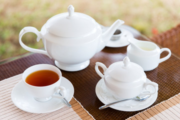 Obraz na płótnie Canvas close up of tea service at restaurant or teahouse