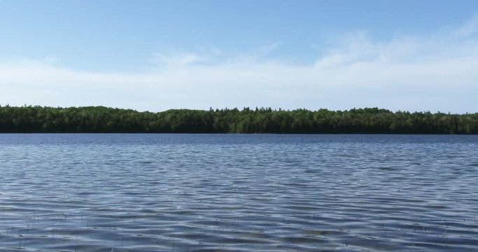 Panoramic view of calm water in Cyprus lake, on the Bruce peninsula in Ontario, Canada
