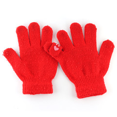 Pair of red winter gloves with love sign