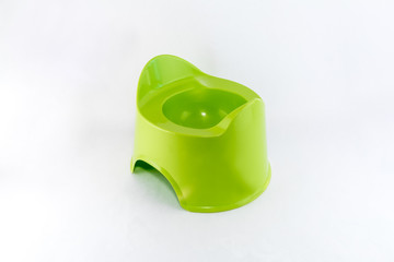 Isolated green toilet potty och white background. 