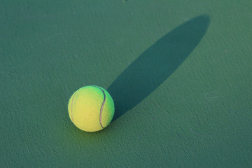 Tennis ball on tennis court