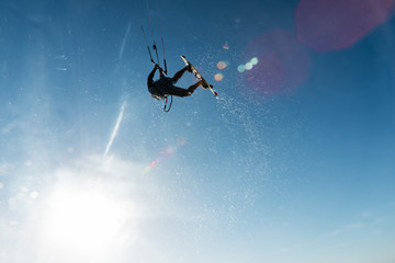 Surfer flying through the sky